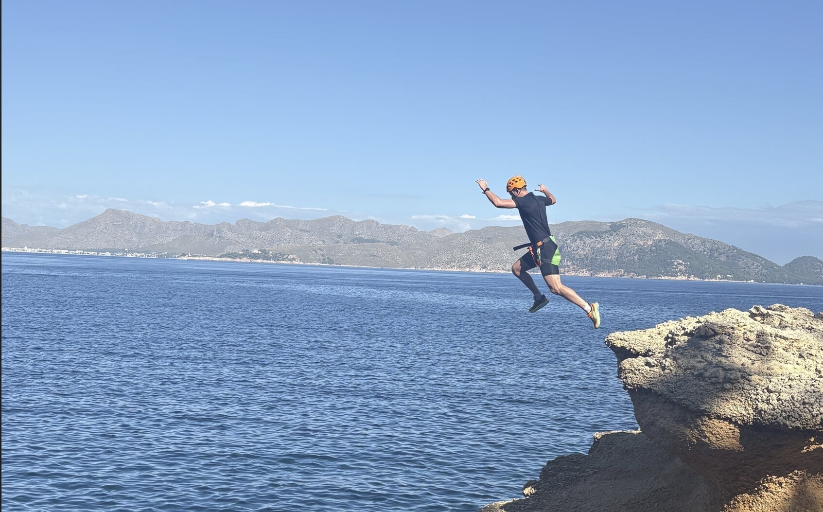 Cliff jumping during coasteering in Alcudia