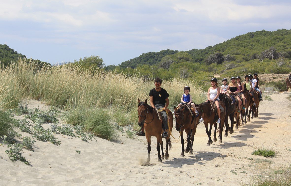 Enjoying horse riding on the beach