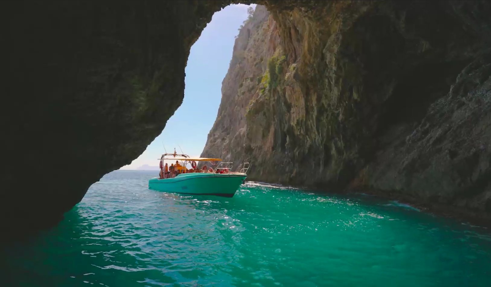 boat drives inside cave